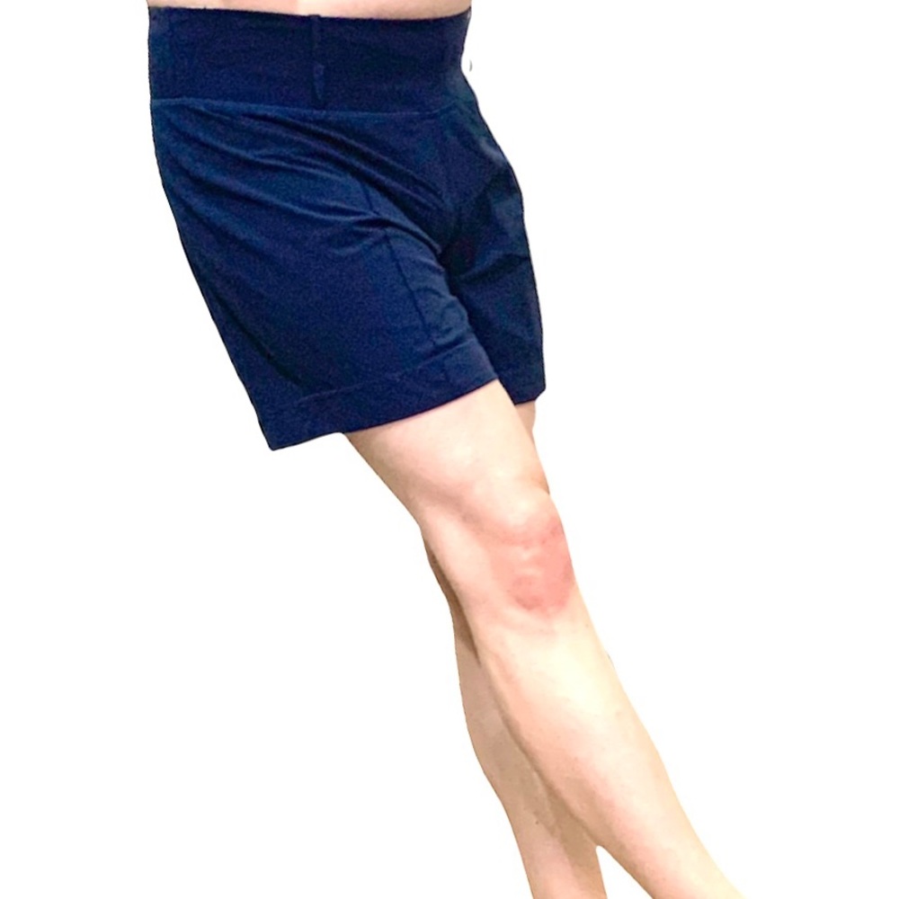Relaxed fit Lululemon navy blue shorts, soft pink lining